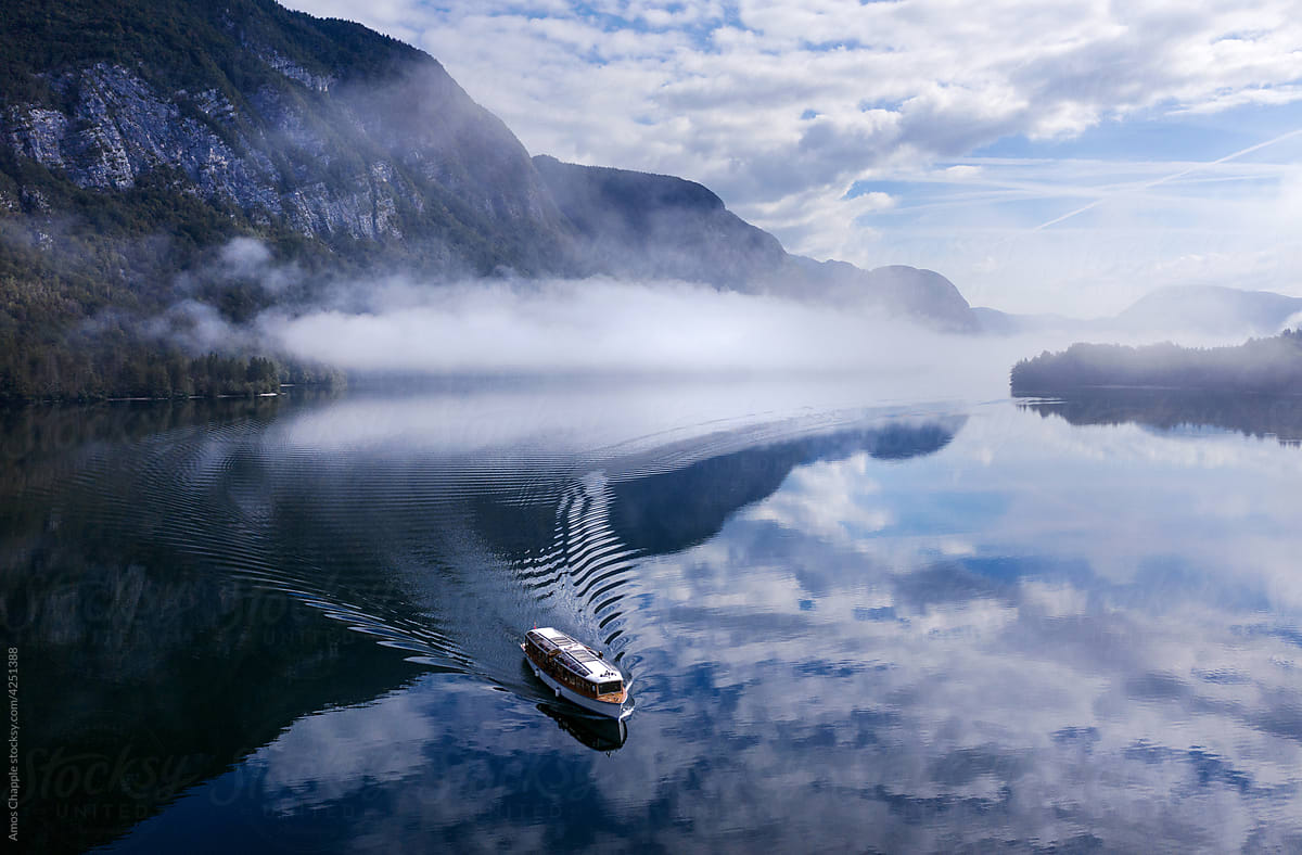 A boat on a misty lake