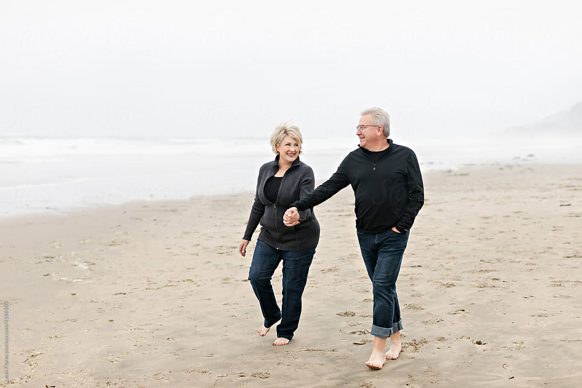 Barefoot Couple Walking in the Sand