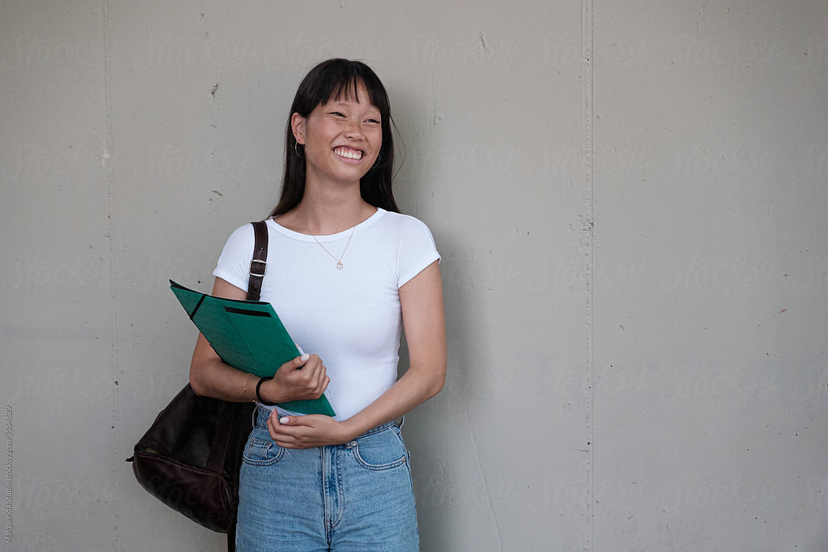 Portrait Of cheerful student smiling