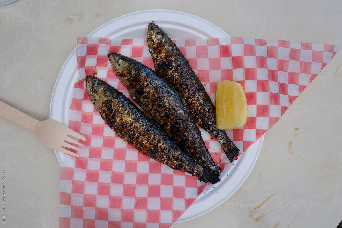 Street food dish of grilled sardines
