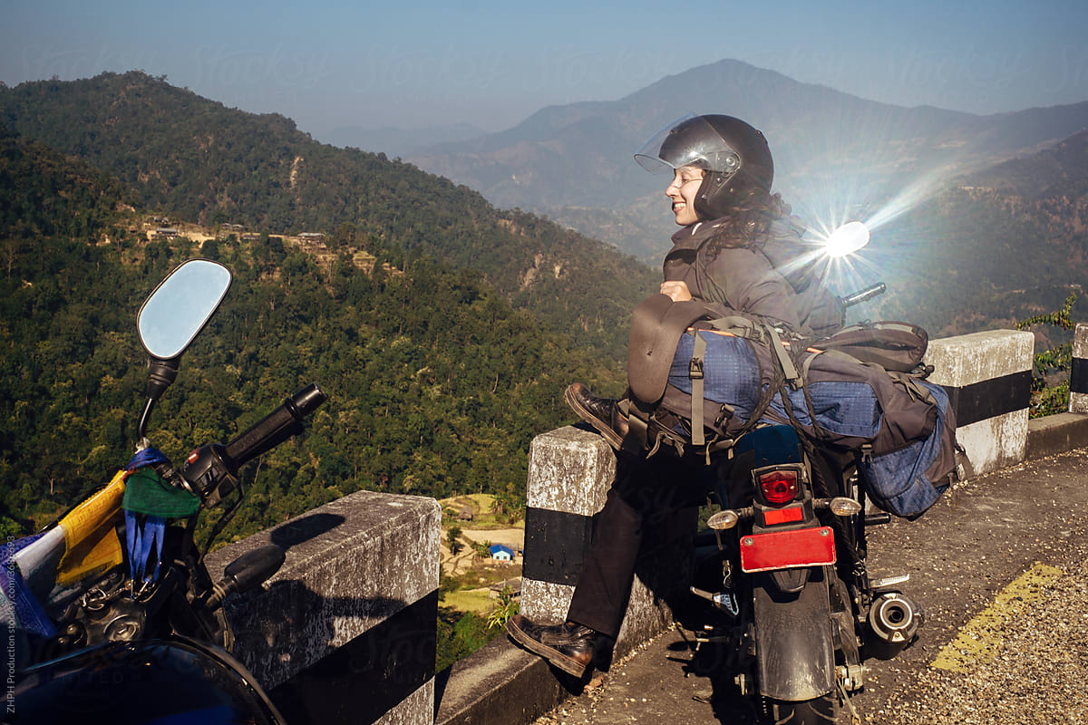 Woman travels by motorcycle