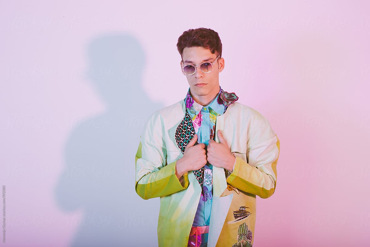 Young Male Fashion Model Posing in Floral Summer Costume