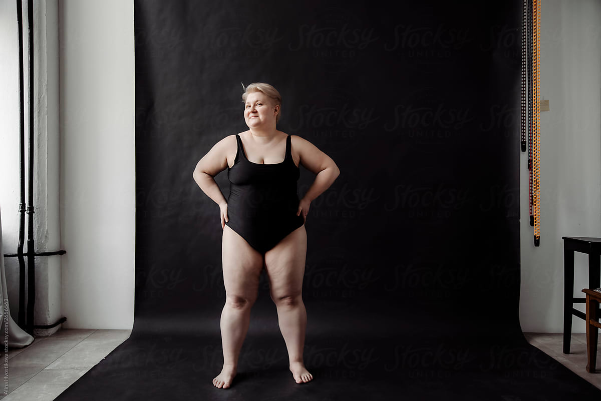 Woman Wearing Black Body Suit Posing At Camera By Stocksy