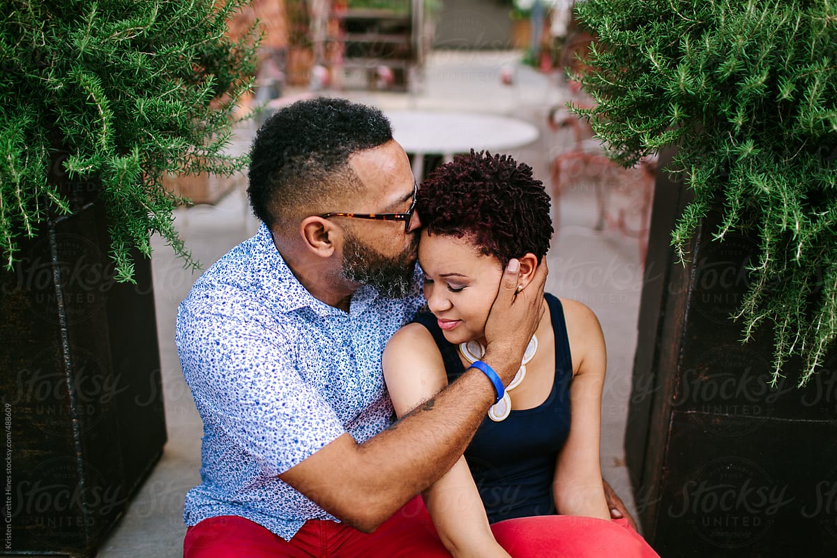 A Young Couple Embracing Each Other By Stocksy Contributor Kristen