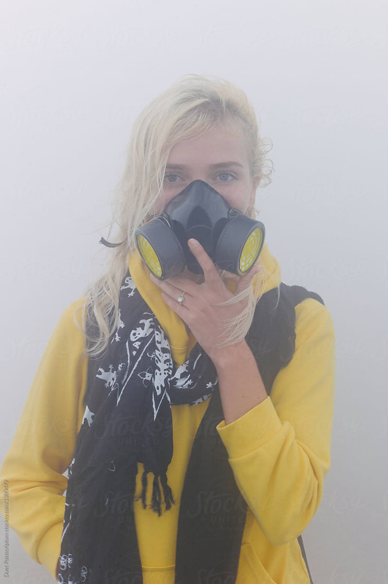 Young female wearing mask for breathing