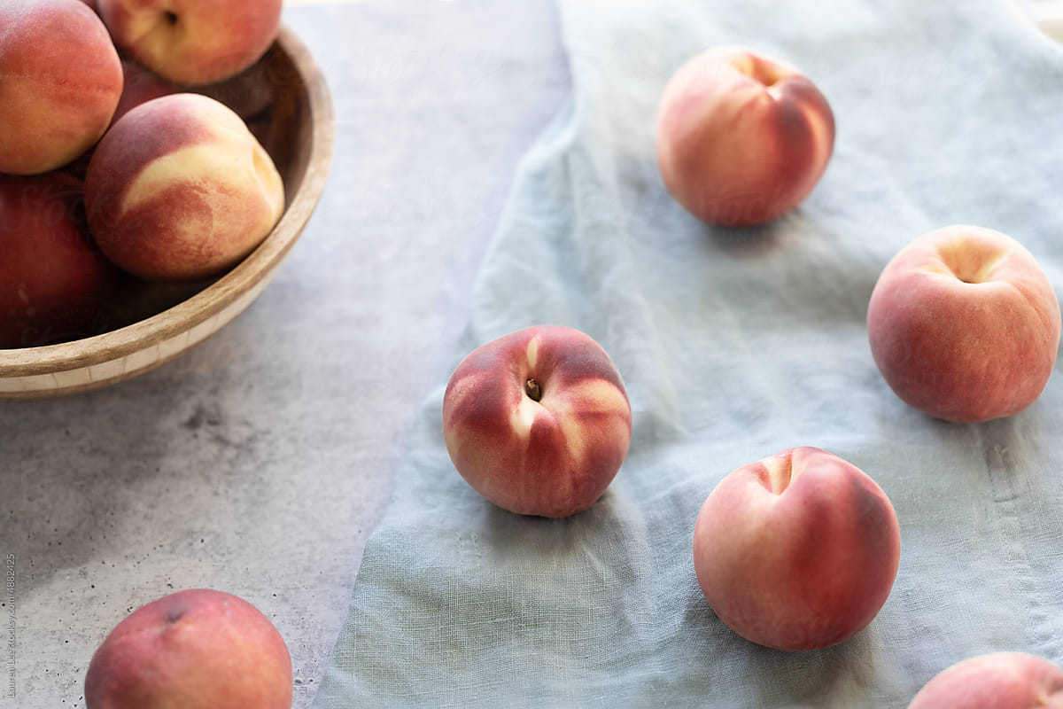 Fresh peaches on countertop