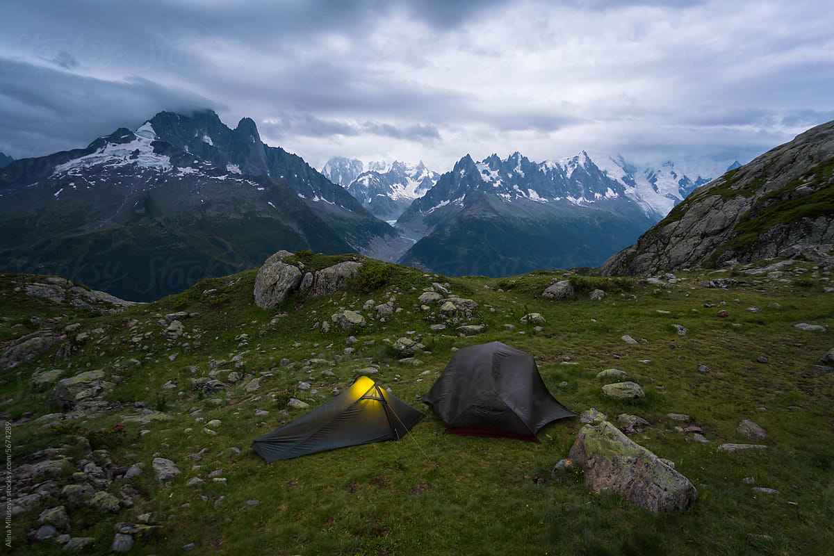 Camping Tents Against Mountain Peaks