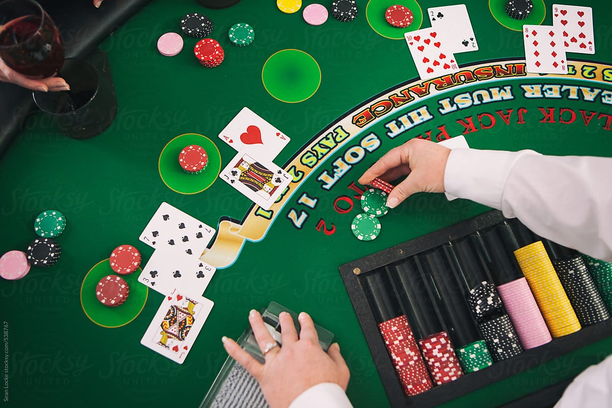 Casino: Dealer Paying Out Winnings In Blackjack