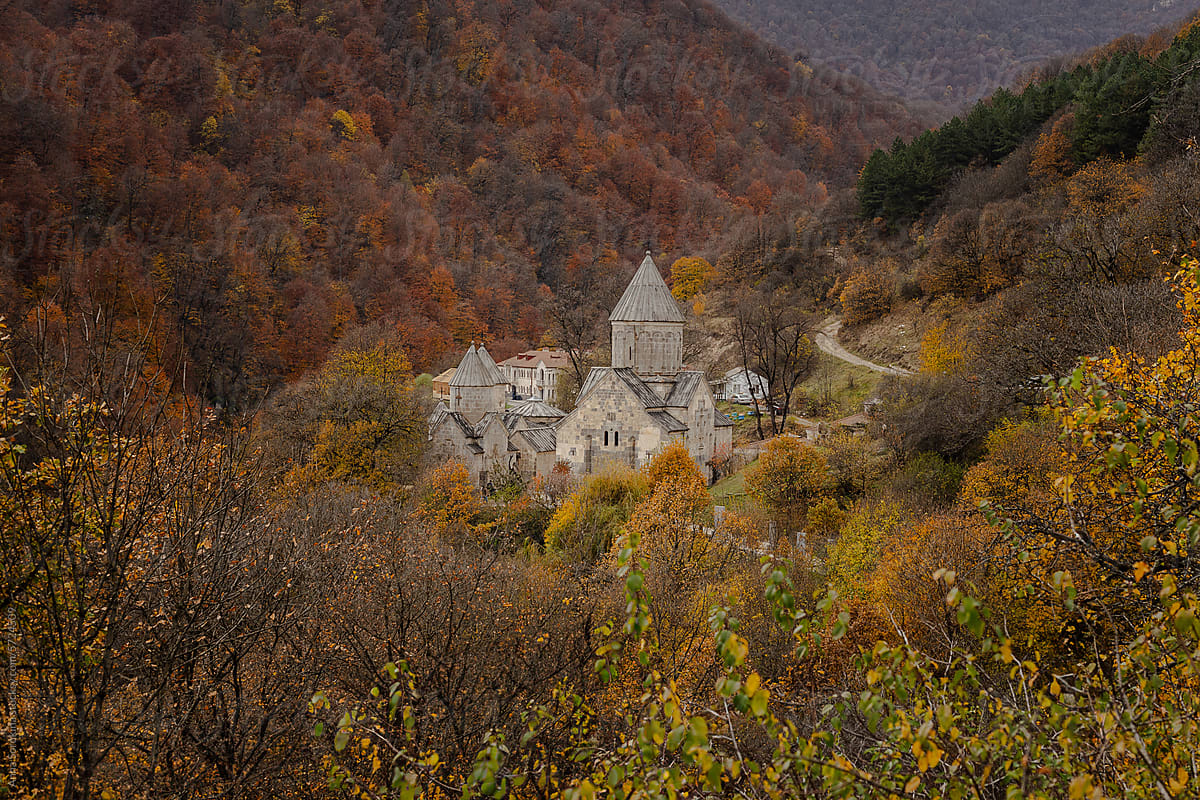 An ancient monastery in an autumn forest