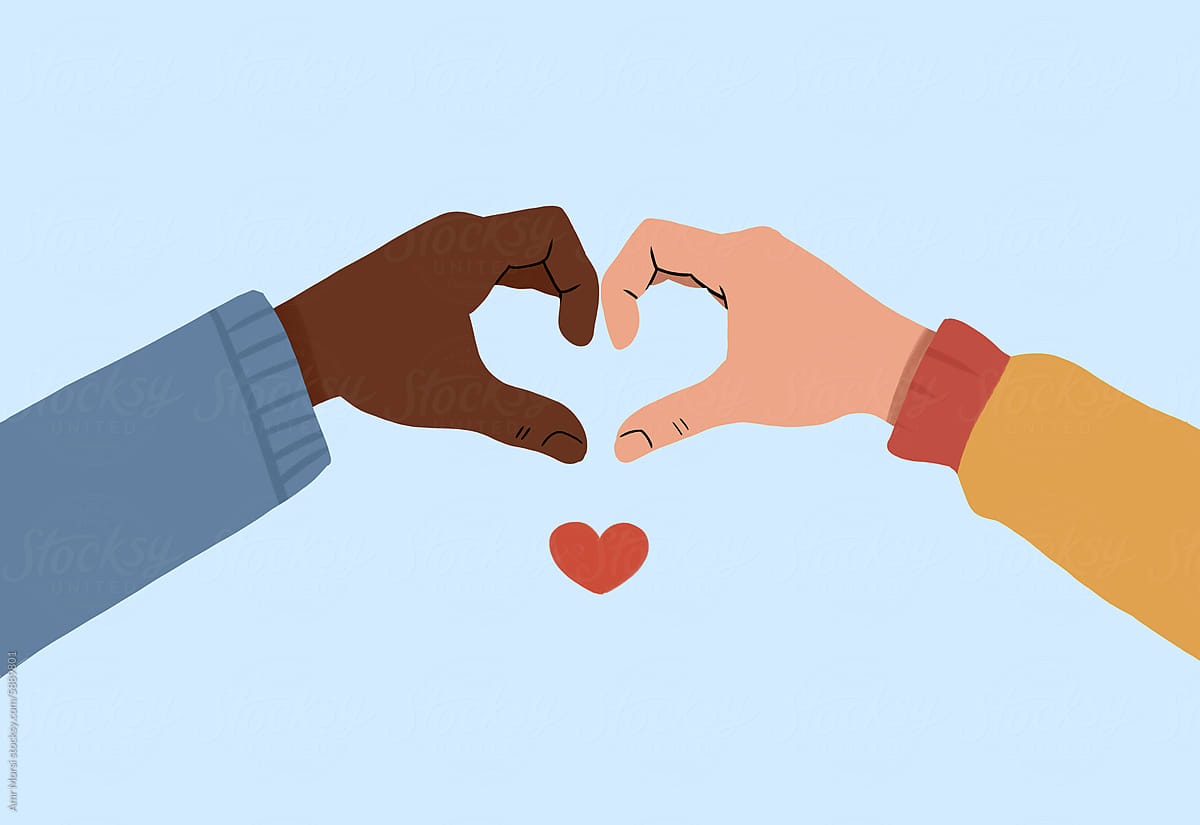 Two hands of different skin tones create a heart shape
