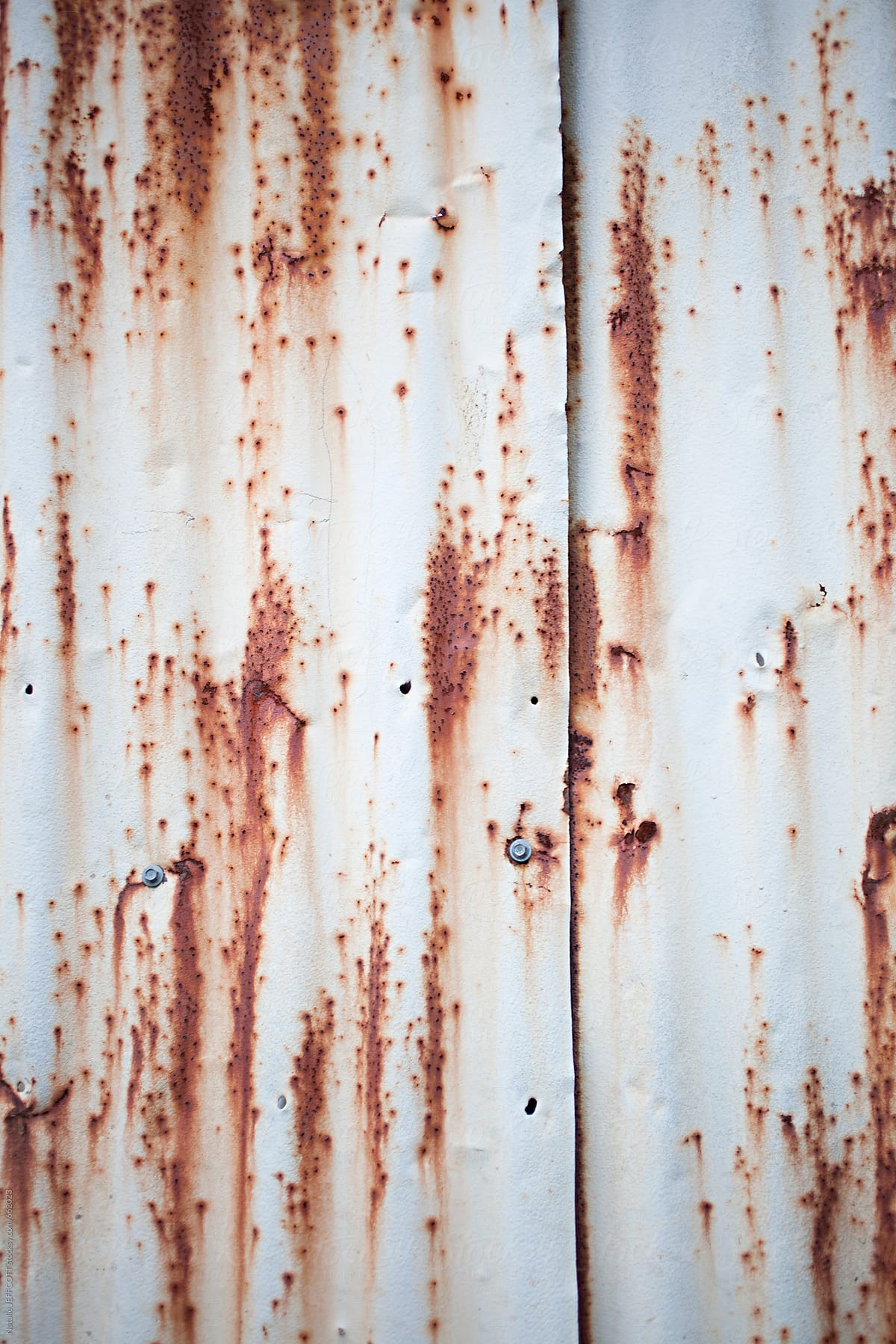 beautiful textured, old and weathered patina on corrugated tin sheds and fences