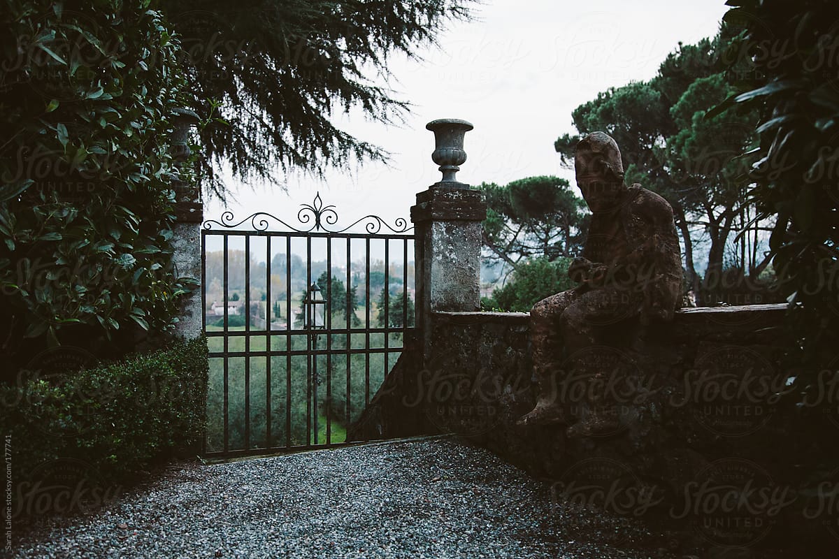 gate at the top of a hill at a villa in lucca, italy
