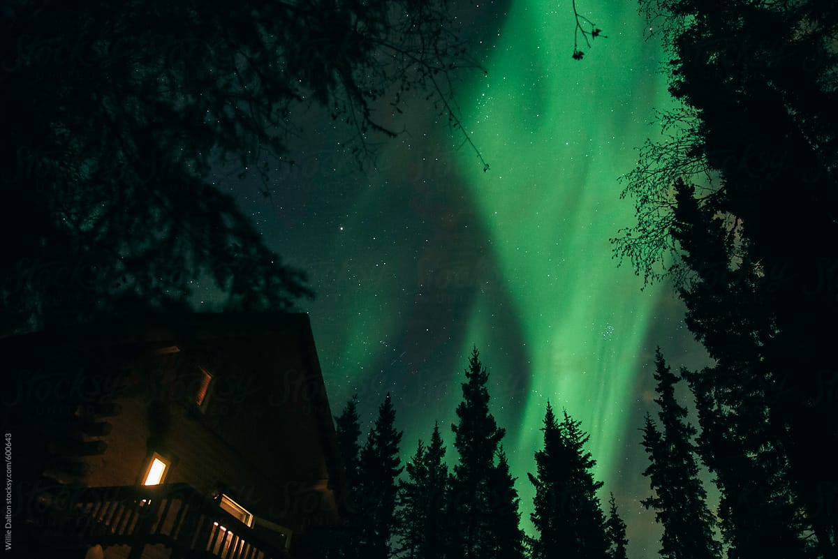 Northern Lights over a Cabin