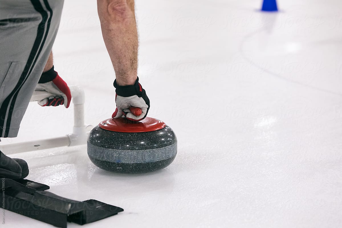 Curling: Man Ready To Push Off From Hack To Throw Stone
