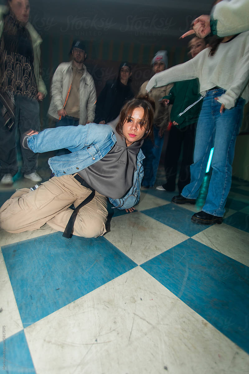 Young woman dancing on the floor
