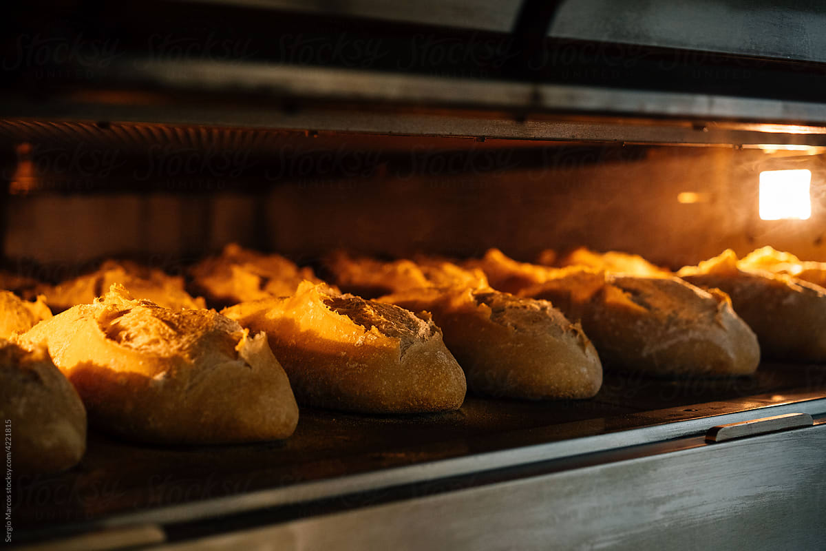 Crispy loaves baking in oven
