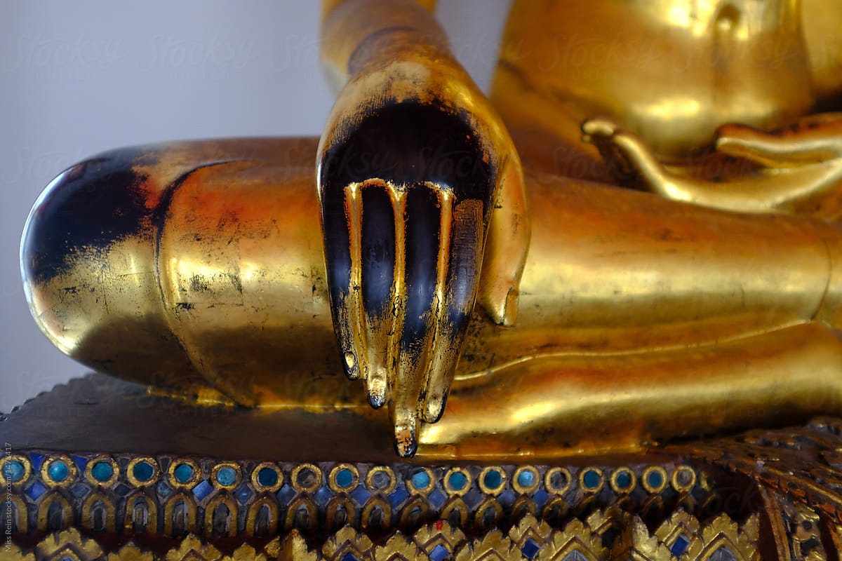 close-up of metal Buddha statue