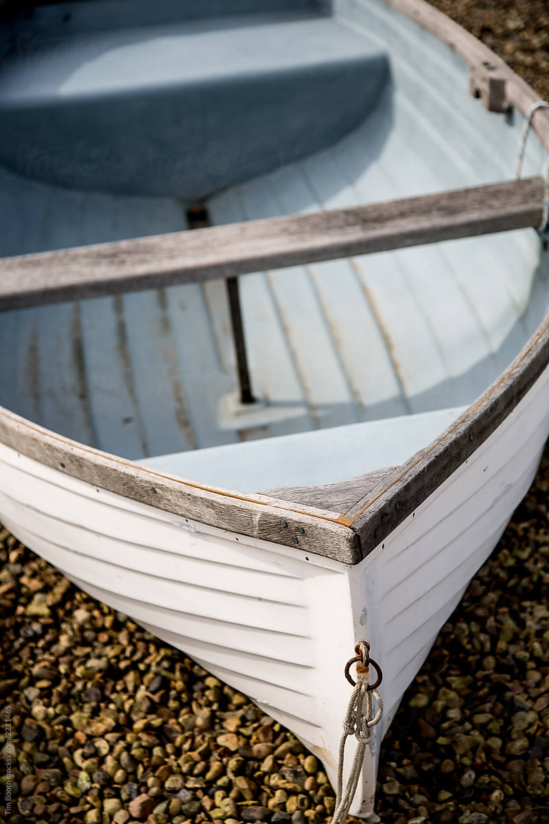A White and blue rowing boat