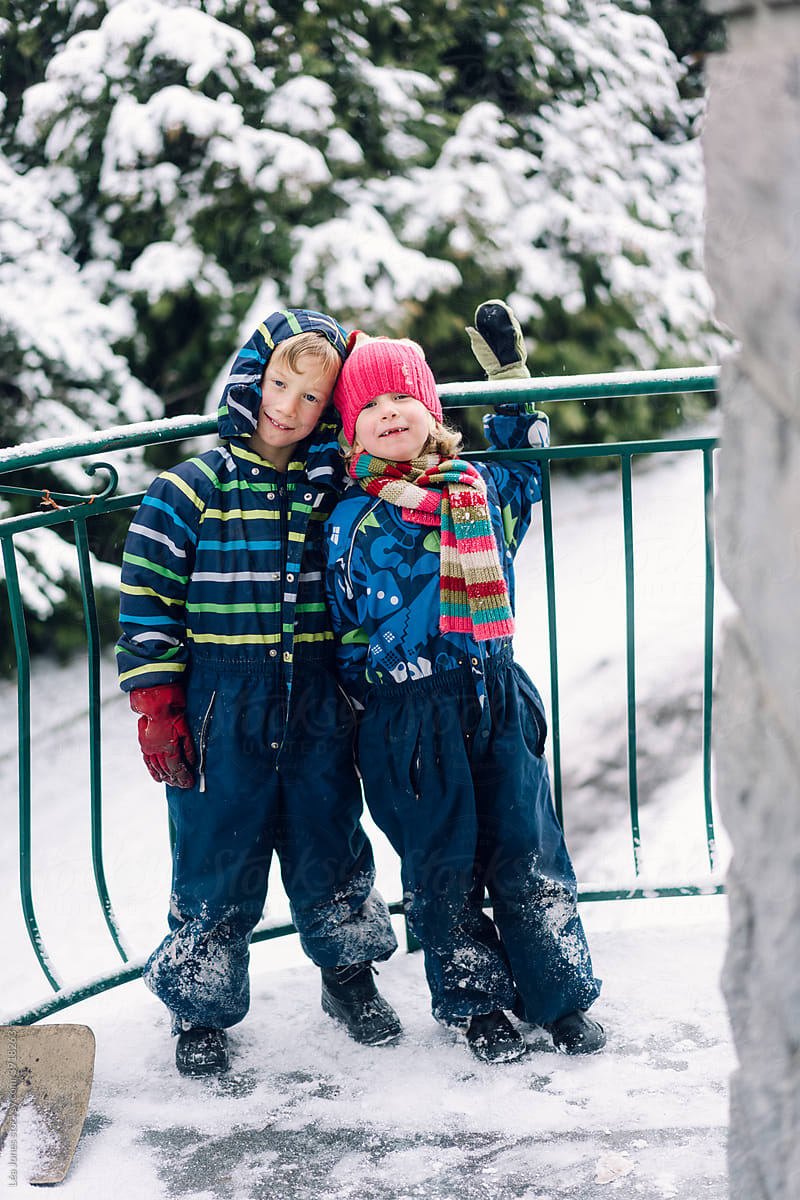 cute siblings in the snow