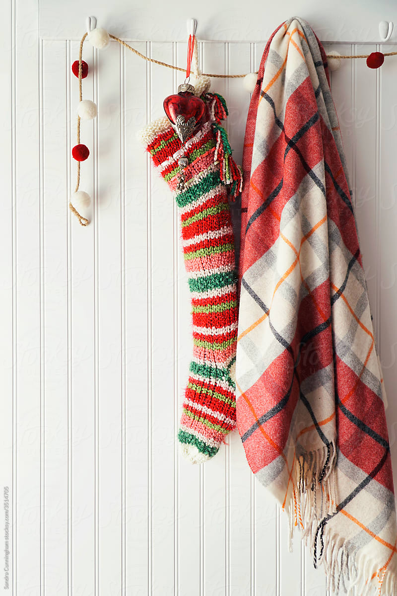 Stripe christmas stocking and ornaments on hooks