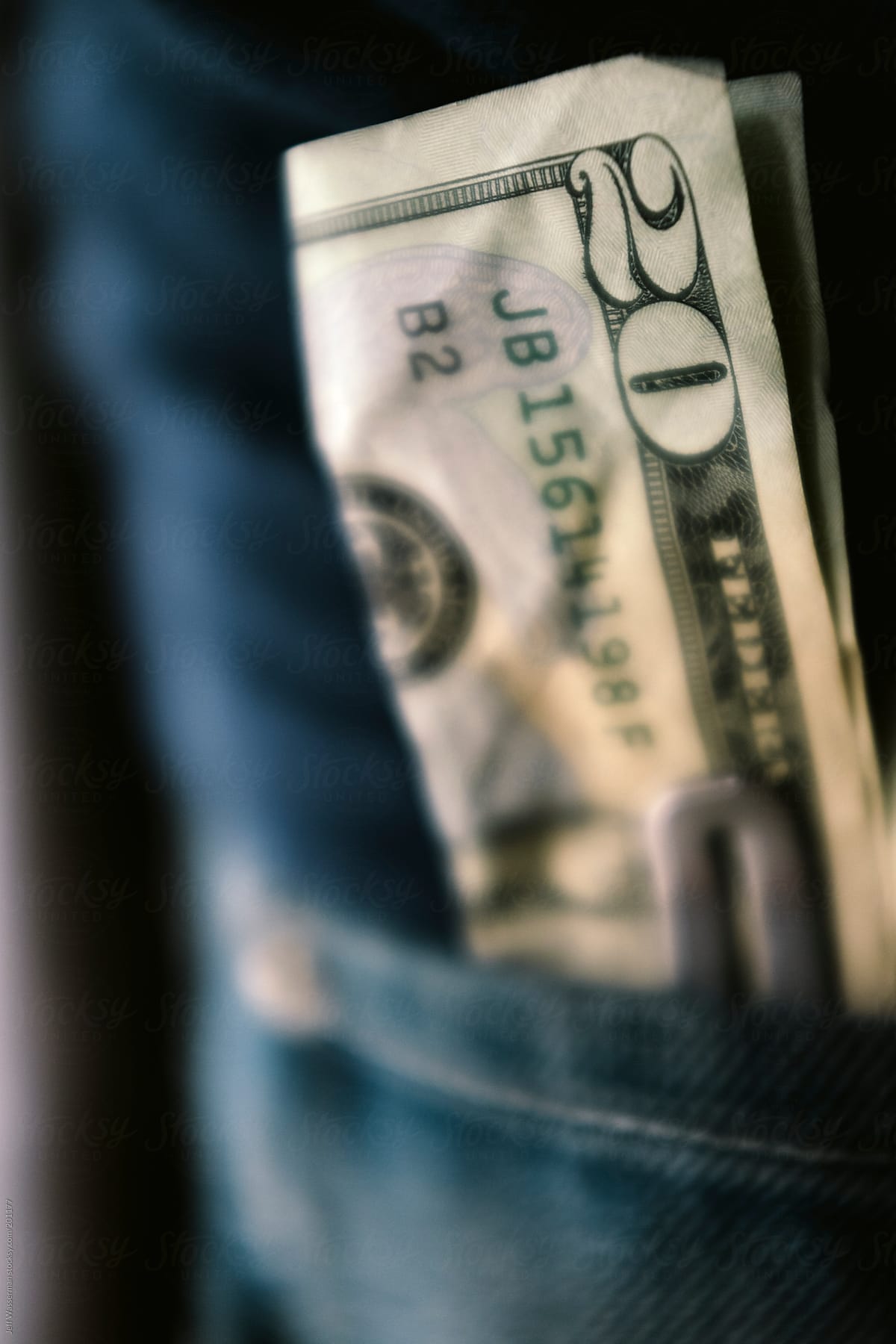 Personal Finance: Twenty Dollar Bill Sticking Out of Pocket