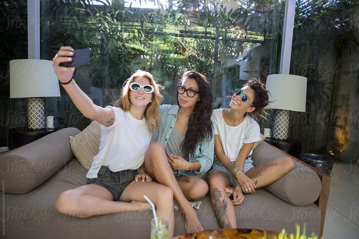 Three Girlfriends Take Selfie Together With Sunglasses On At Home By 