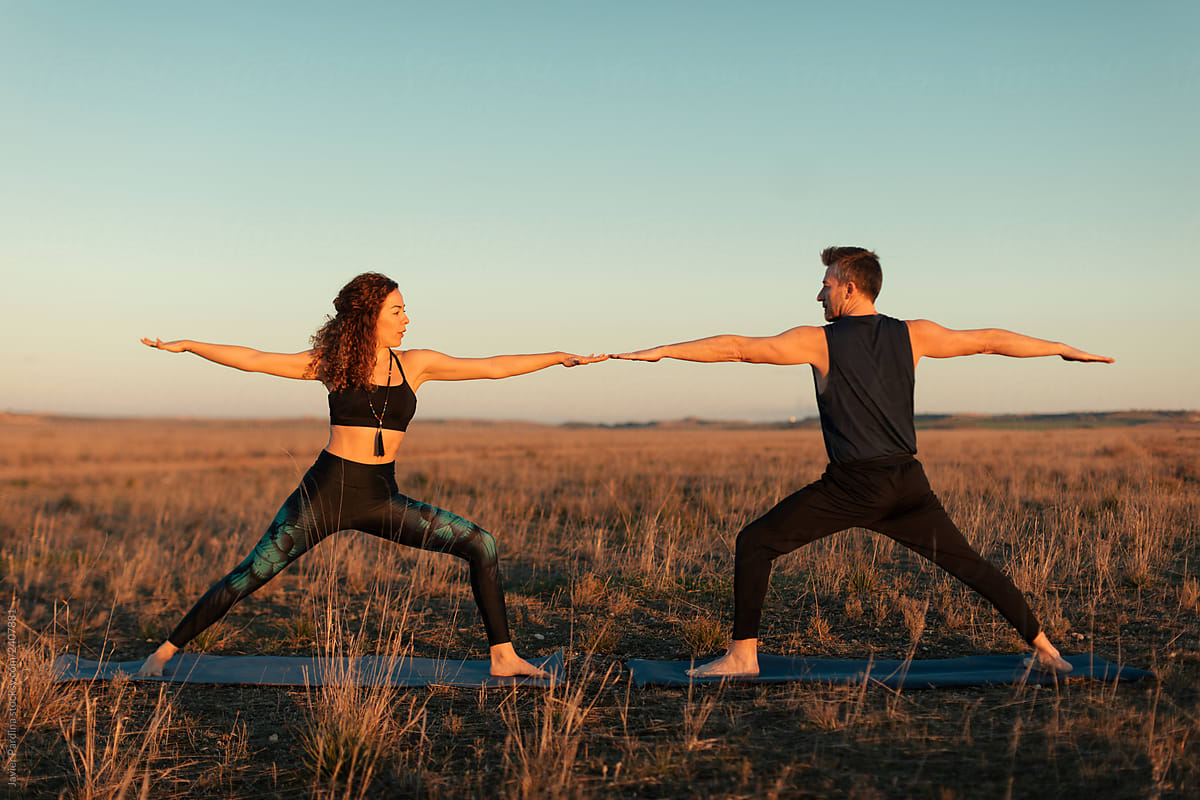 Couple Practicing Yoga By Stocksy Contributor Javier Pardina Stocksy 5120