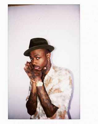 Cool Tattooed Black Guy With Fedora Hat 