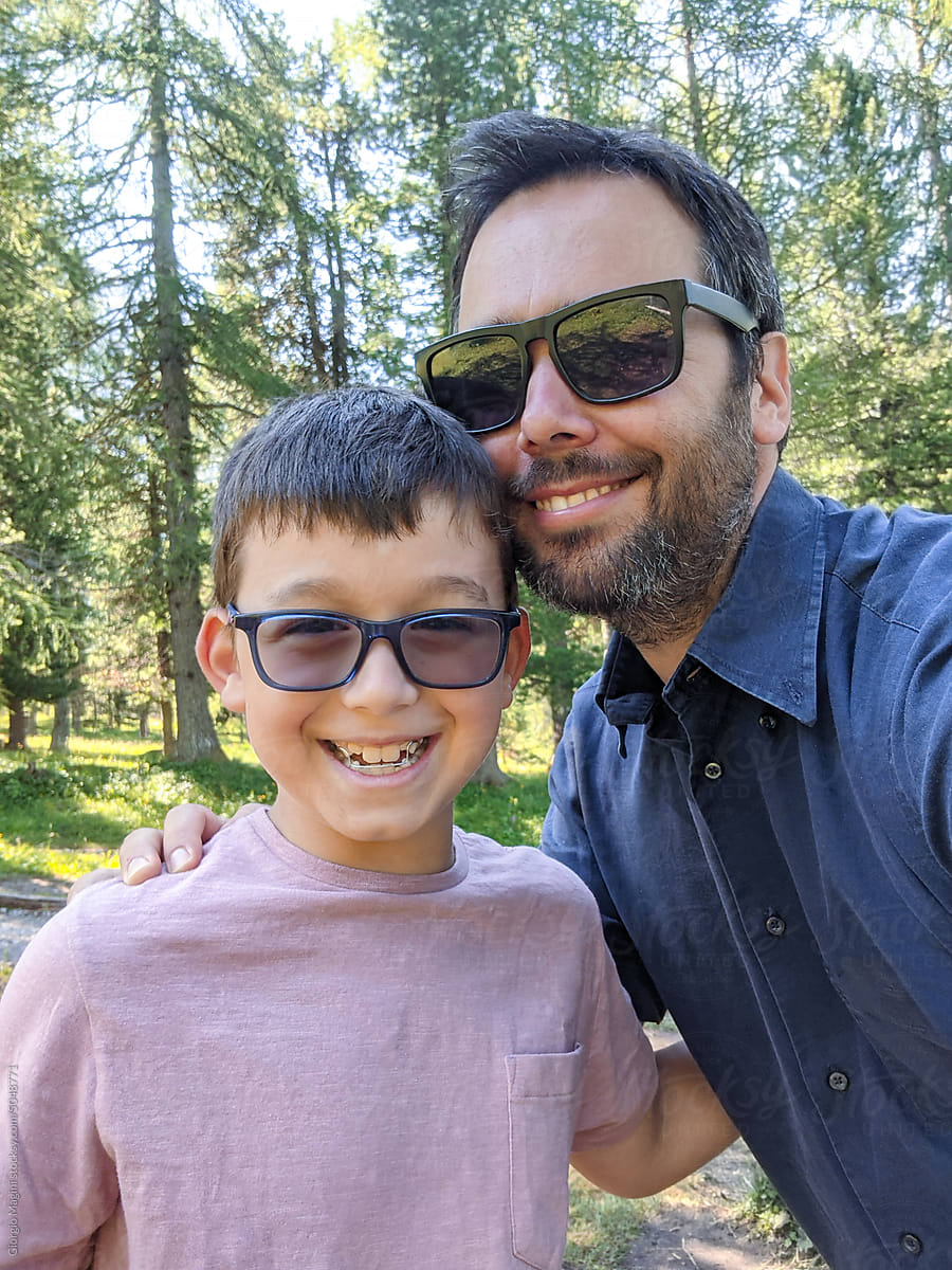 Father and Son Happy Selfie Together during Mountain Vacations