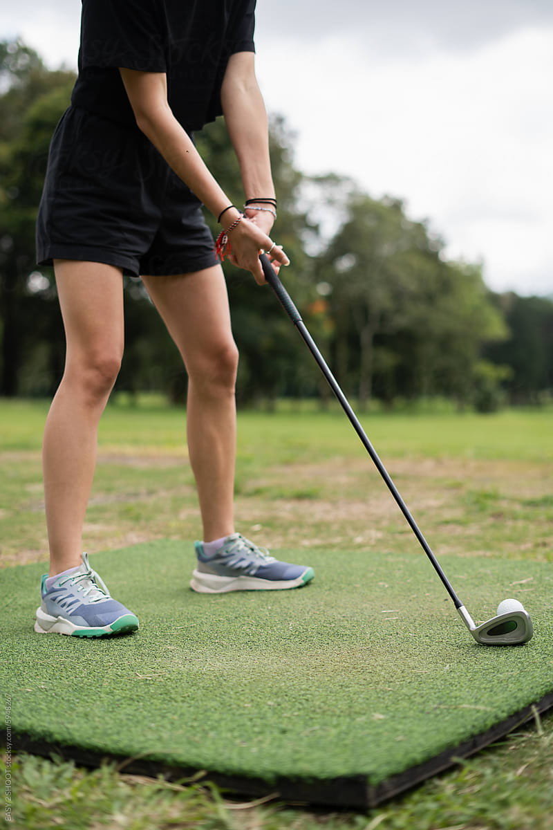 Unrecognizable Woman Golfing With Golf Club