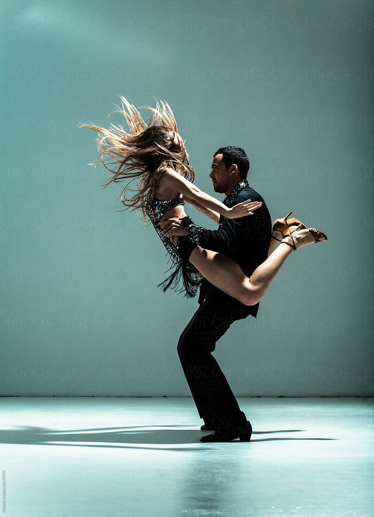 Young couple of professional dancers.