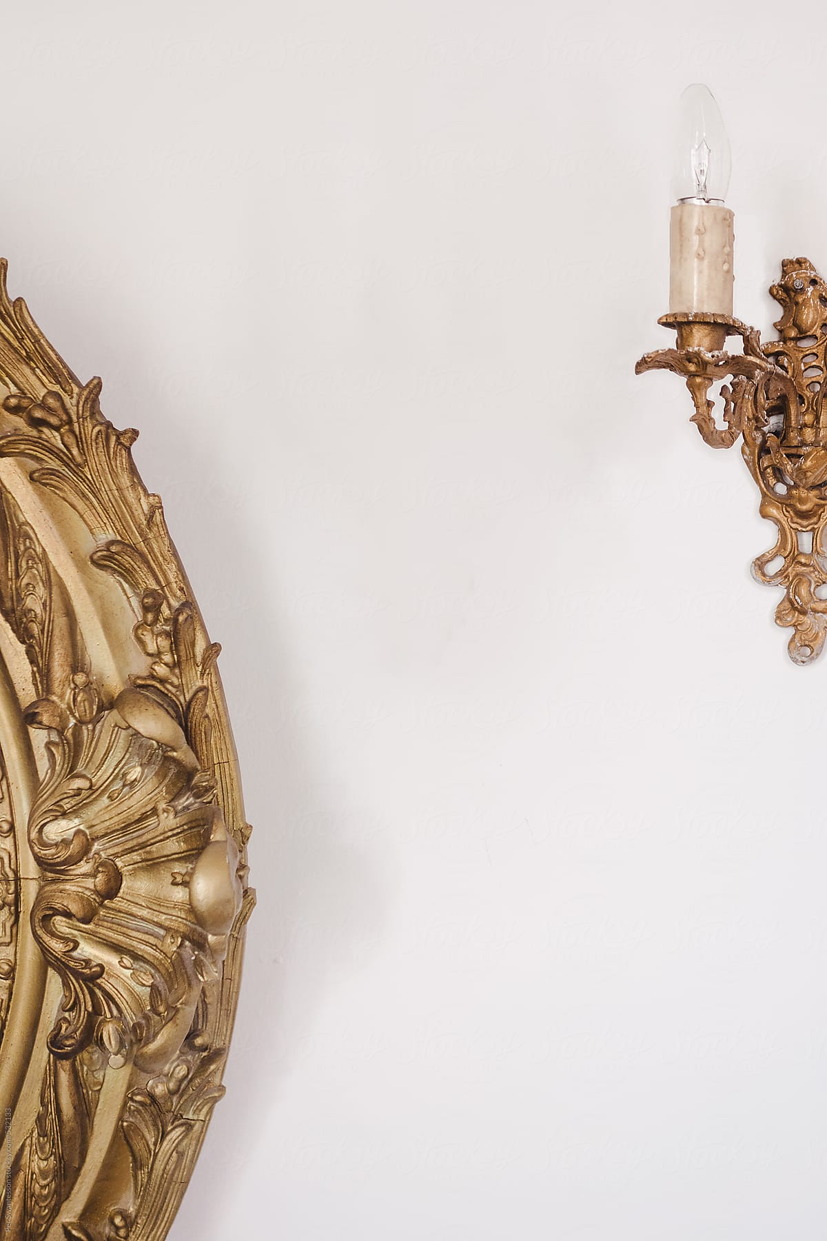 Antique golden sconce and decor