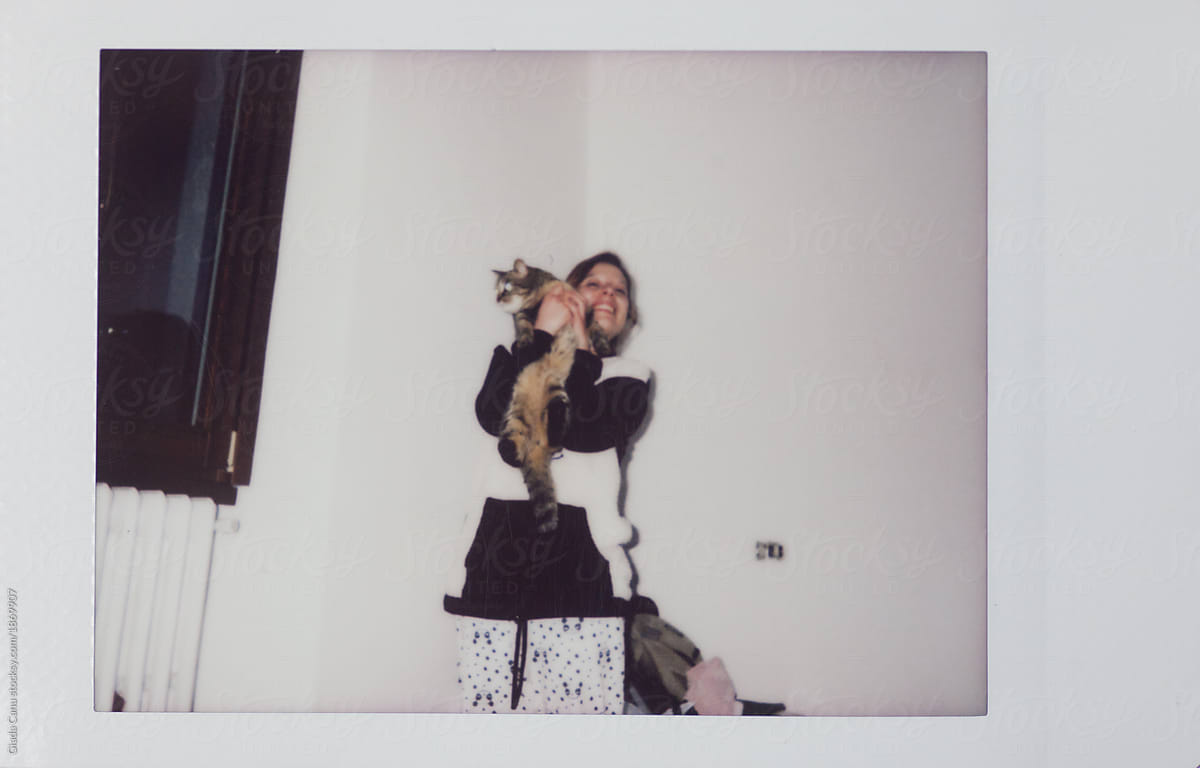 Woman in pajama with a cat