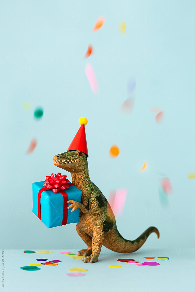 Dinosaur with birthday gift