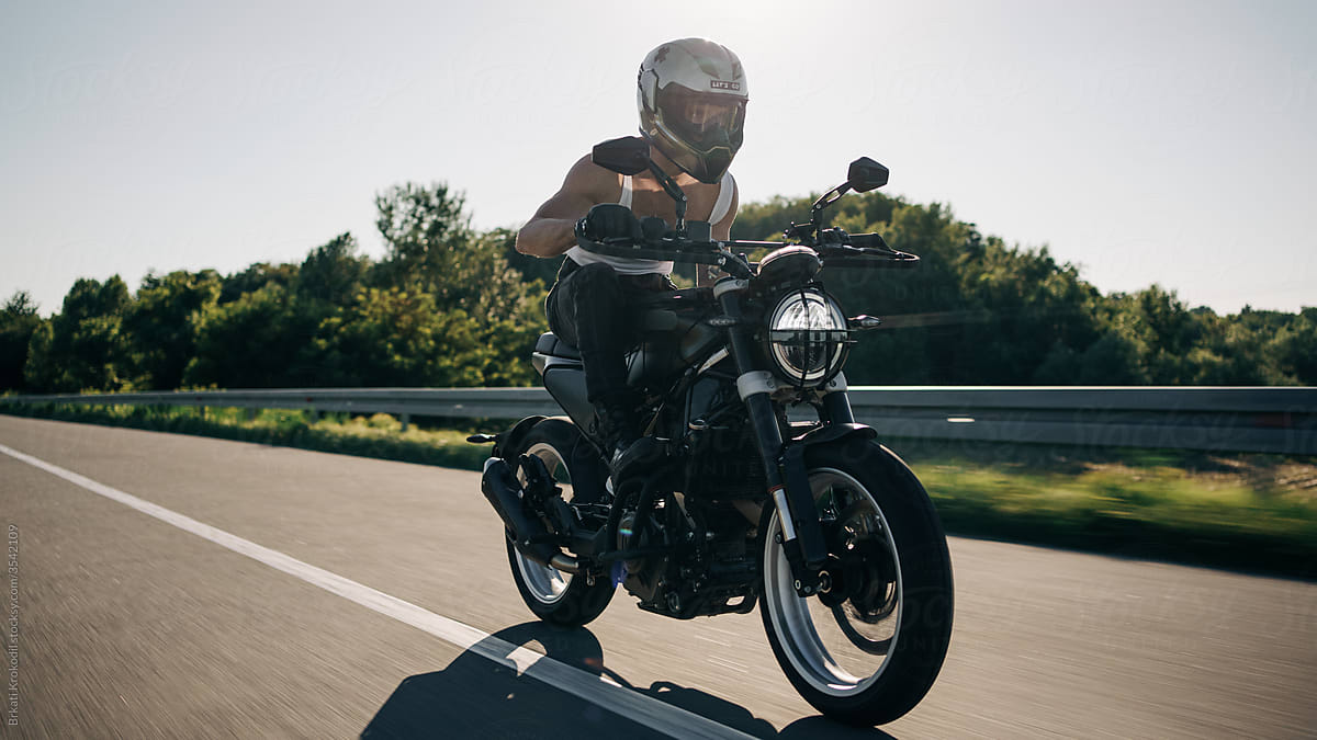 Anonymous Man Riding Motorbike