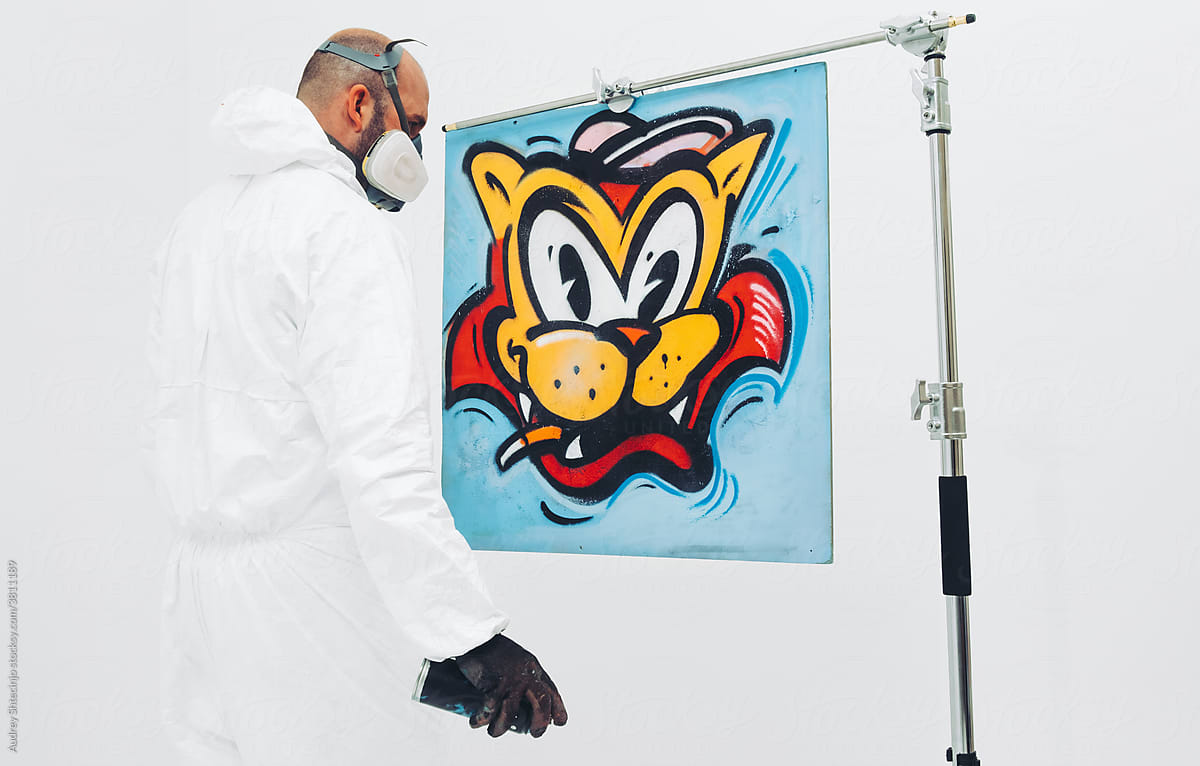 Street Artist Working In Studio On Typography And Graffiti Illustrations