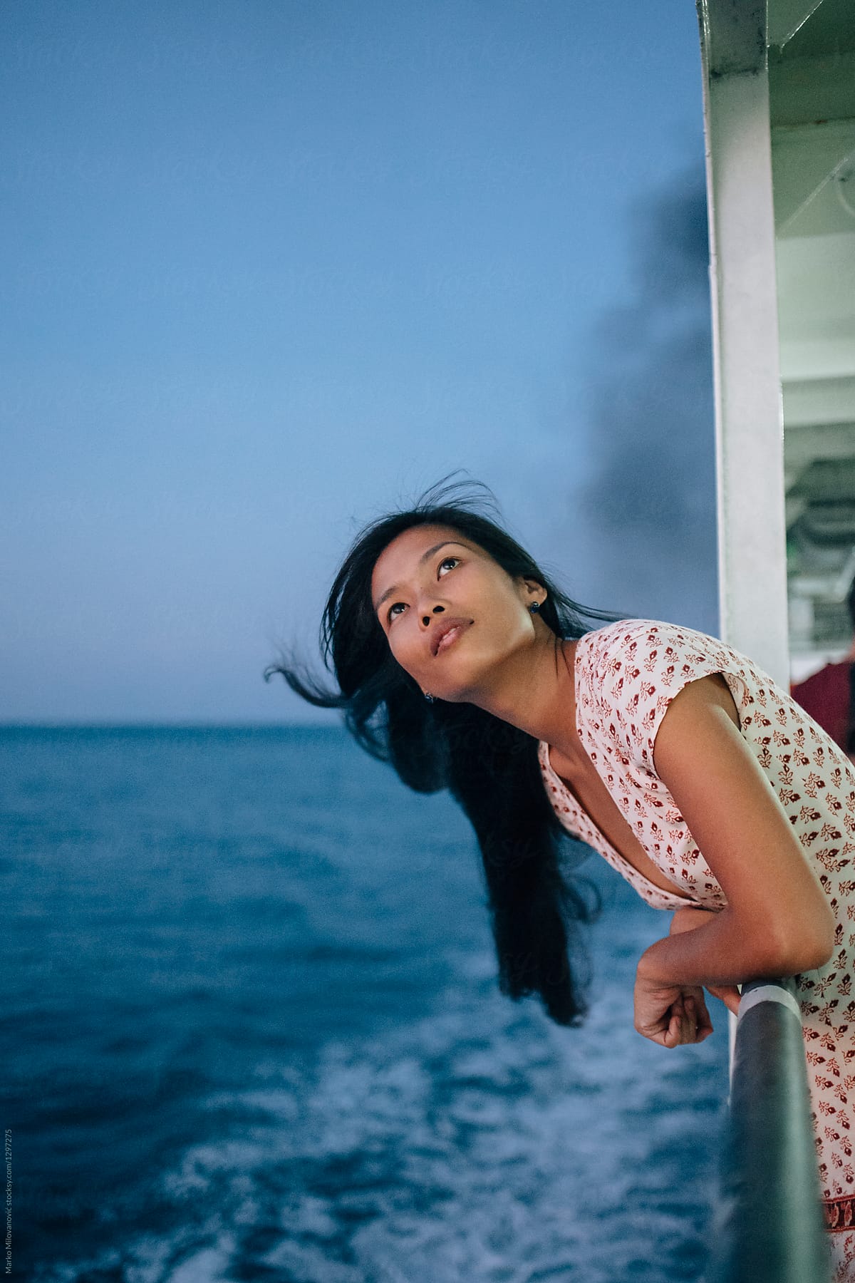 Woman Travelling Enjoying Sunset And Wind On Ferry Boat By Stocksy Contributor Marko Stocksy