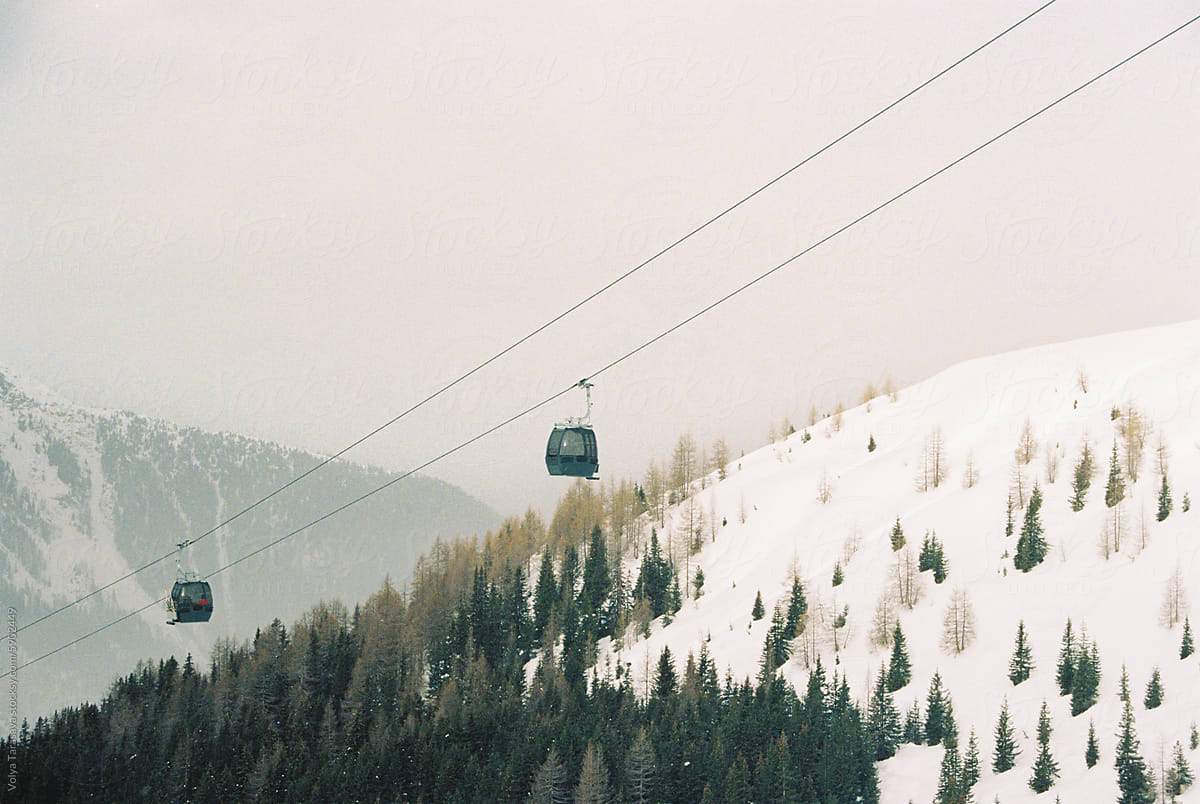 Cable cars opposite the mountains