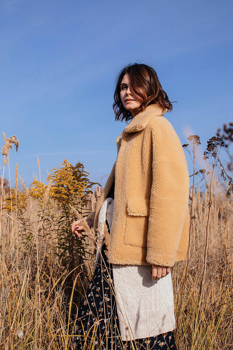 Autumn fashion portrait of woman in eco fur coat