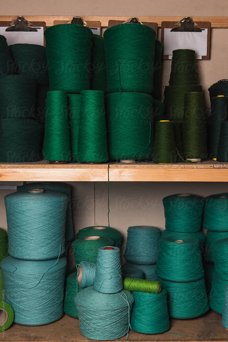 Big rolls of wool in different shades of green