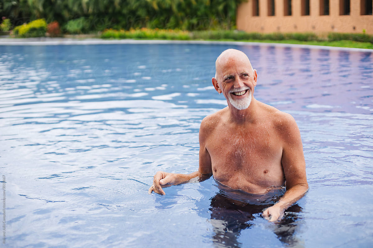 Healthy, active retirement-age man enjoying the pool.