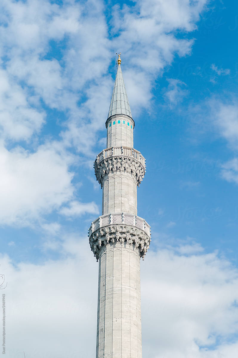 Amazing tower and blue sky. Minaret of the Suleiman Mosque