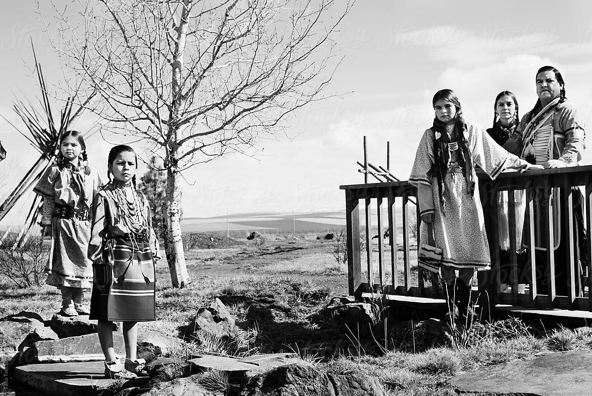 Native American family stands for a portrait