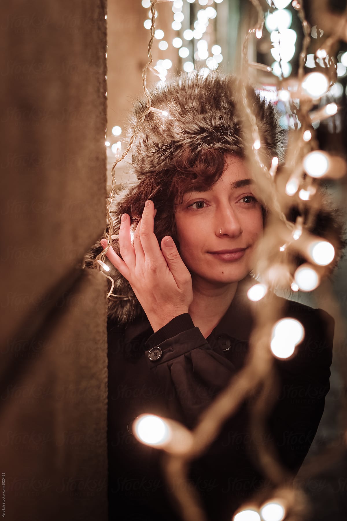 Databasen Interaktion misundelse Portrait Of A Woman With Christmas Light" by Stocksy Contributor "Vera  Lair" - Stocksy