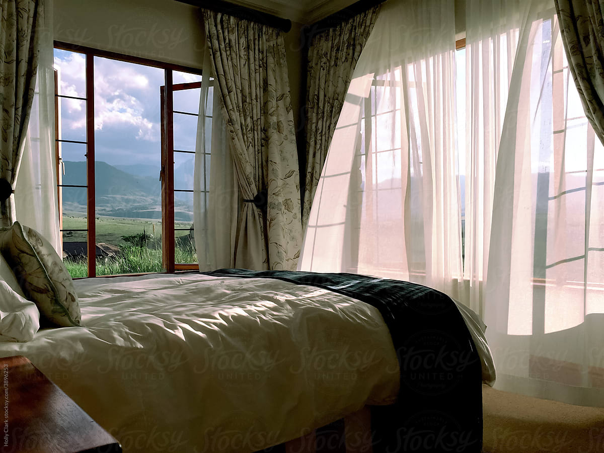 Bedroom with a beautiful view on a soothing afternoon