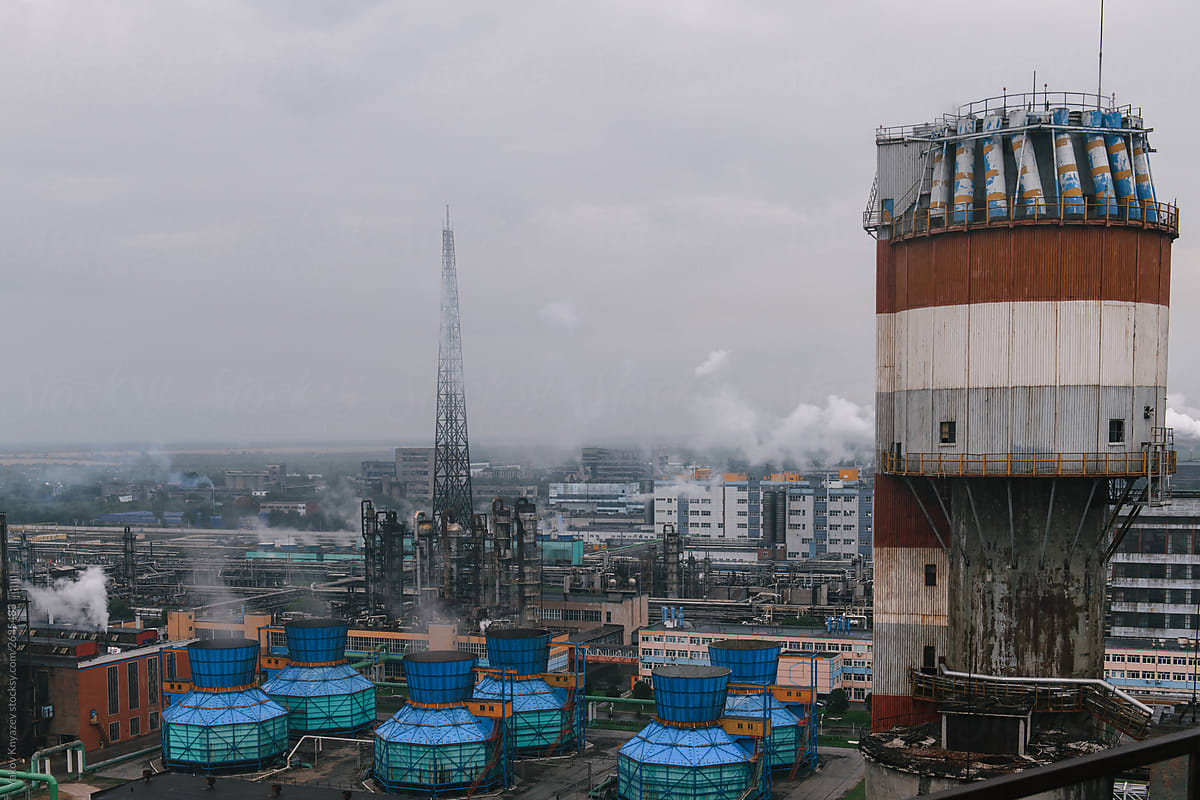 working chemical plant with old buildings and chimneys