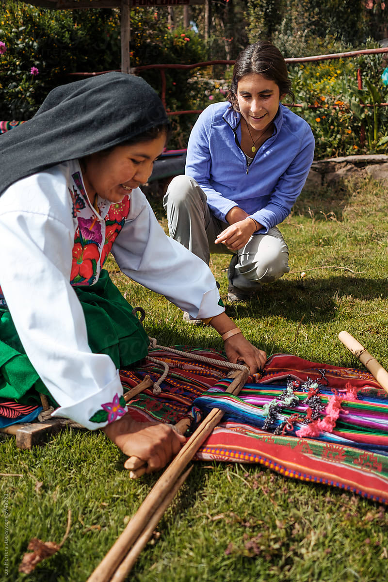 tourist learning traditional peruvian culture