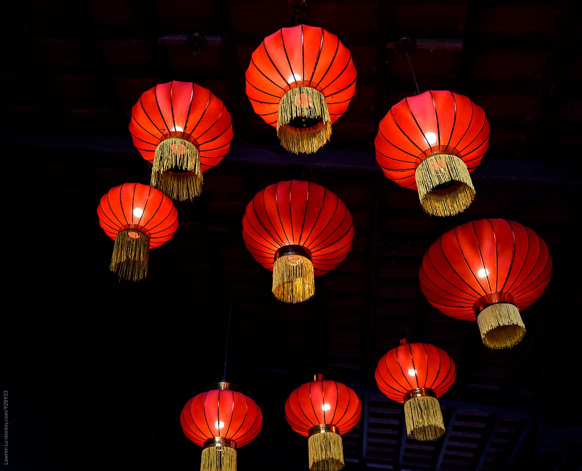red paper chinese lanterns hanging on ceiling