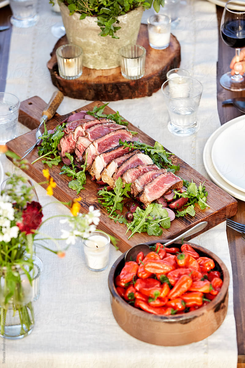 Ribeye steak with arugula salad at a Farm To Table Dinner Party