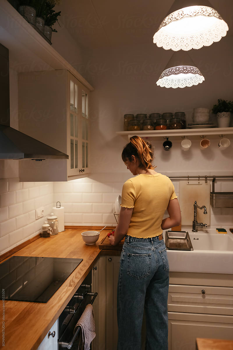 Woman preparing lunch in kitchen